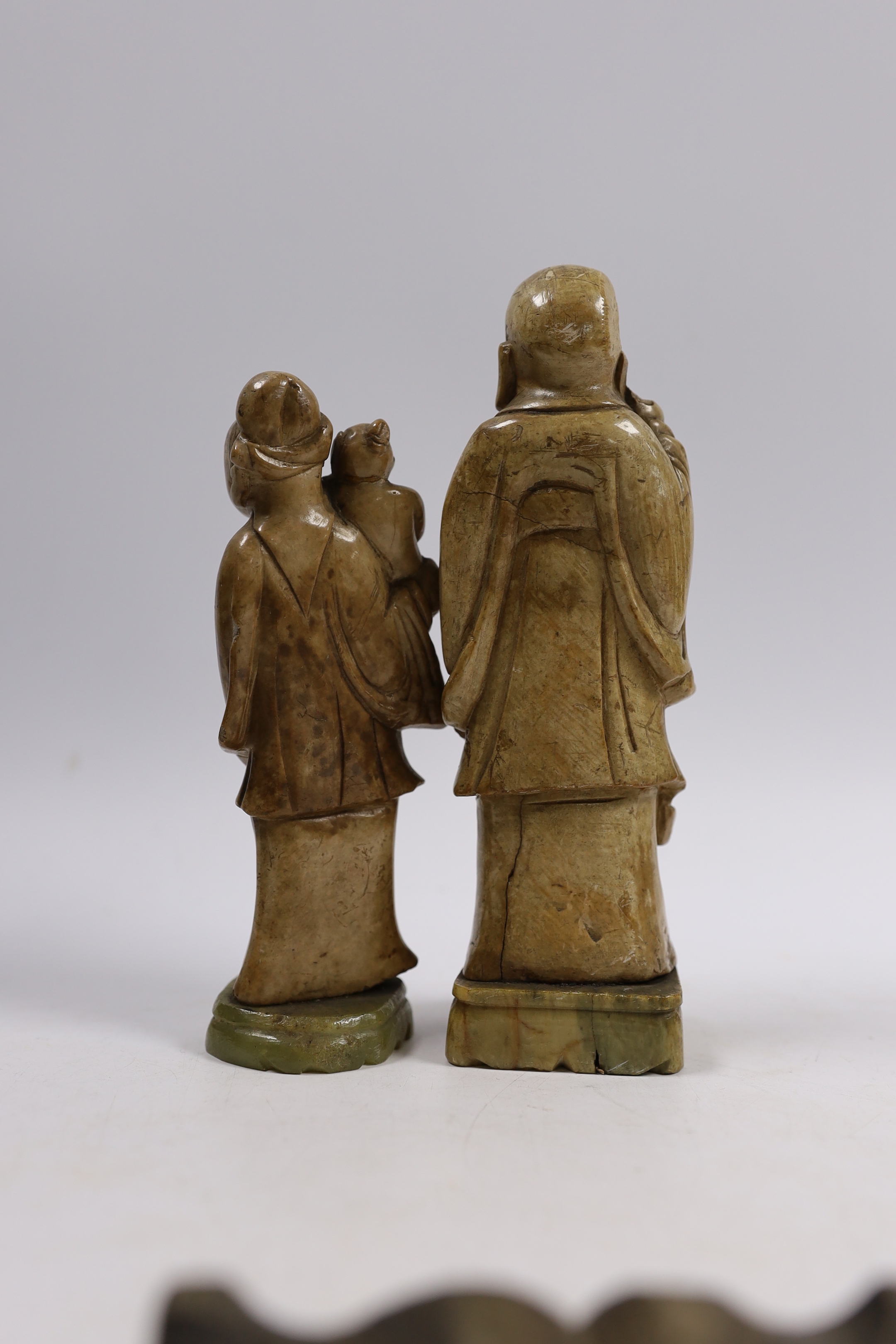 Two Chinese soapstone figures, two bronze lion dogs, etc. tallest figure 18cm high (4)